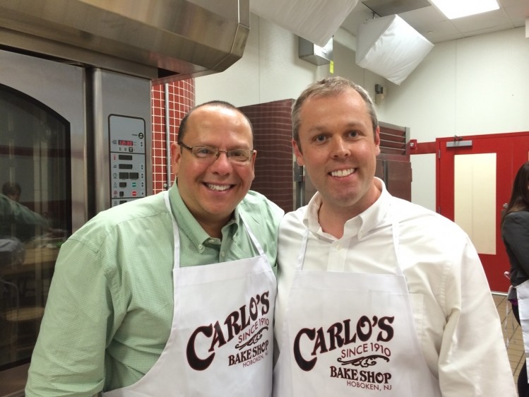 Left to right: Single Cup Coffee sales representative Bill Cook and co-founder Robin White in the Buddy Valastro's (Cake Boss, whose brand Single Cup licensed) New Jersey bakery. White: “Consumers want variety. They had access to Green Mountain's Vermont Country Blend for last 20 years. They want fresh brands and something new and exciting."