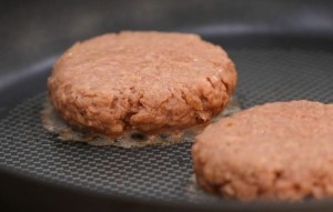 Beyond Meat burgers cooking