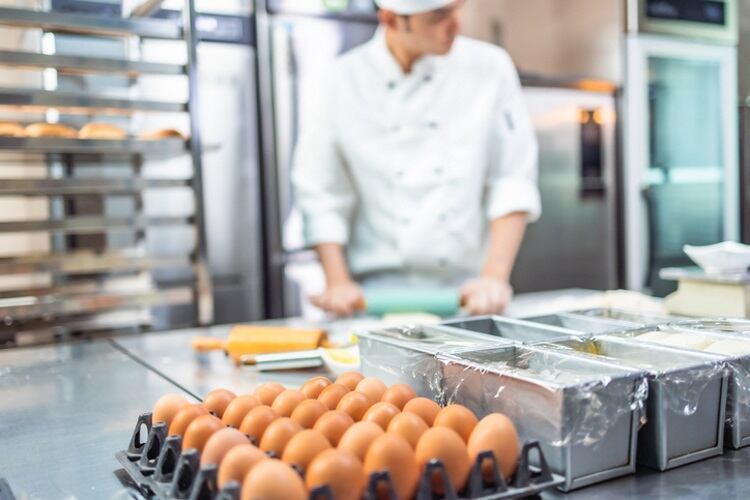 Baker with eggs