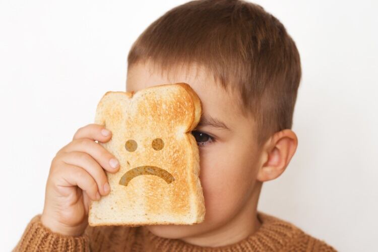 Unhappy-bread-customer-boy-gluten-free-CreativeBird.jpg