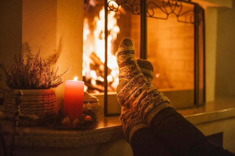 Feet up in front of a fire