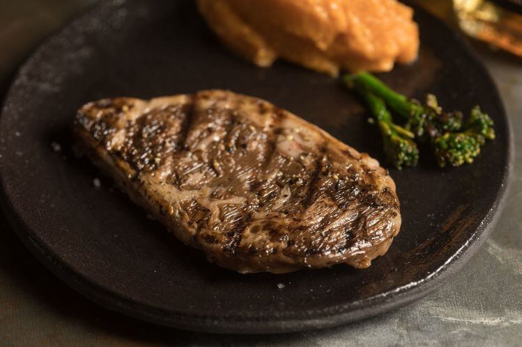 When will cell-cultured meat reach price parity with conventional meat? 