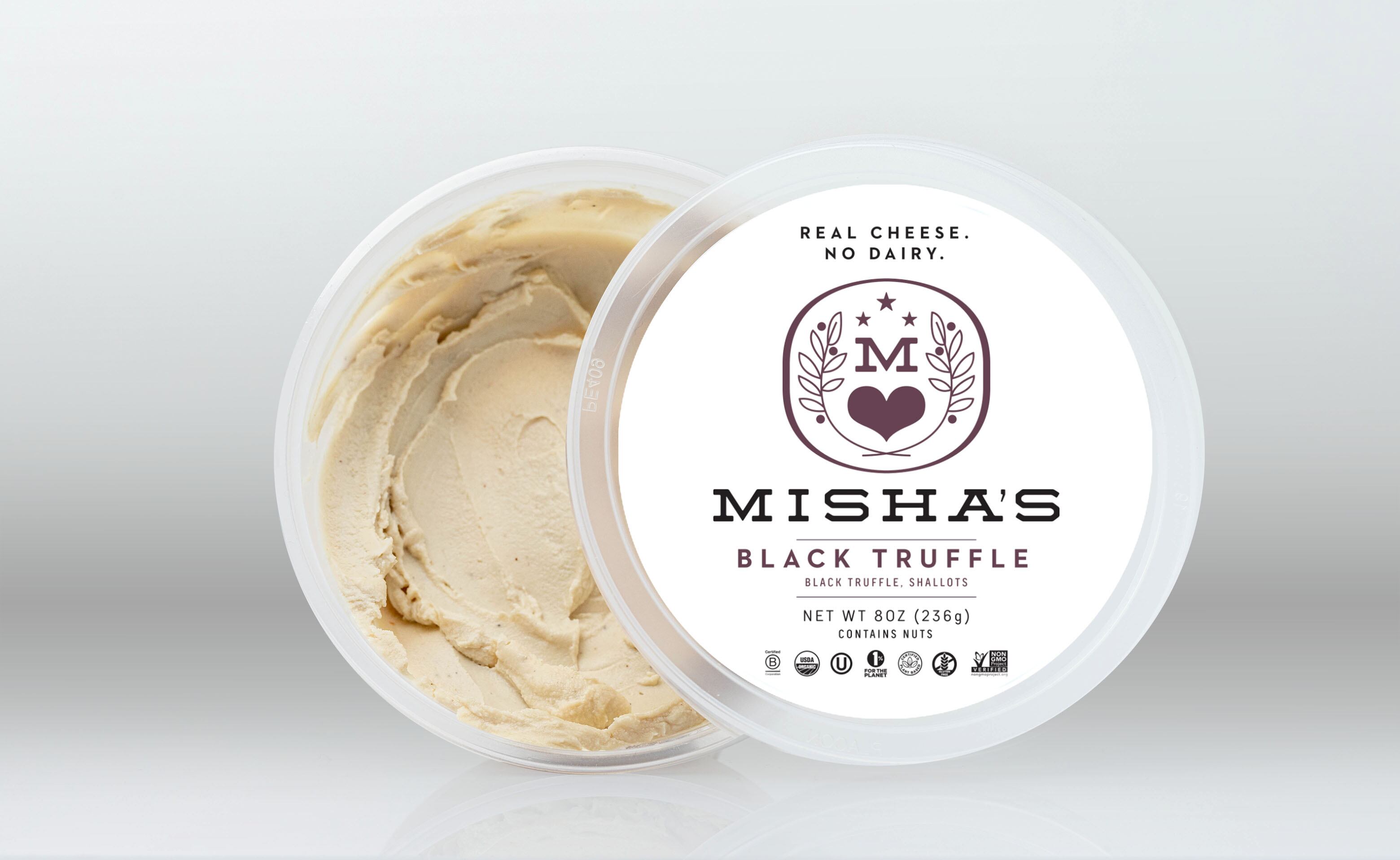 Tub of Misha's plant-based spreadable truffle cheese