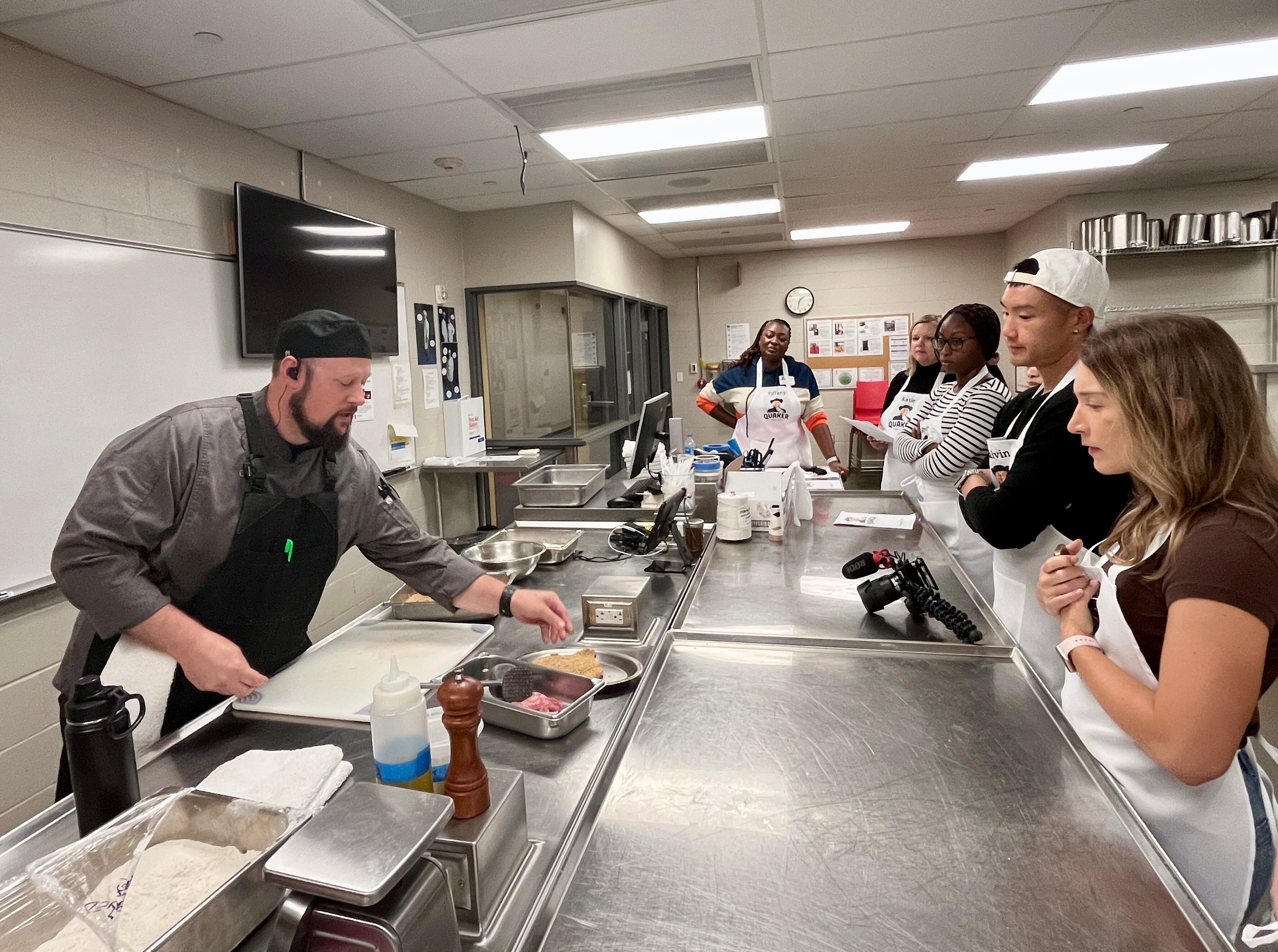 Social media influencers attend a cooking class where they made pork ribeye cutlet breaded with Quaker Cinnamon Life Cereal.
