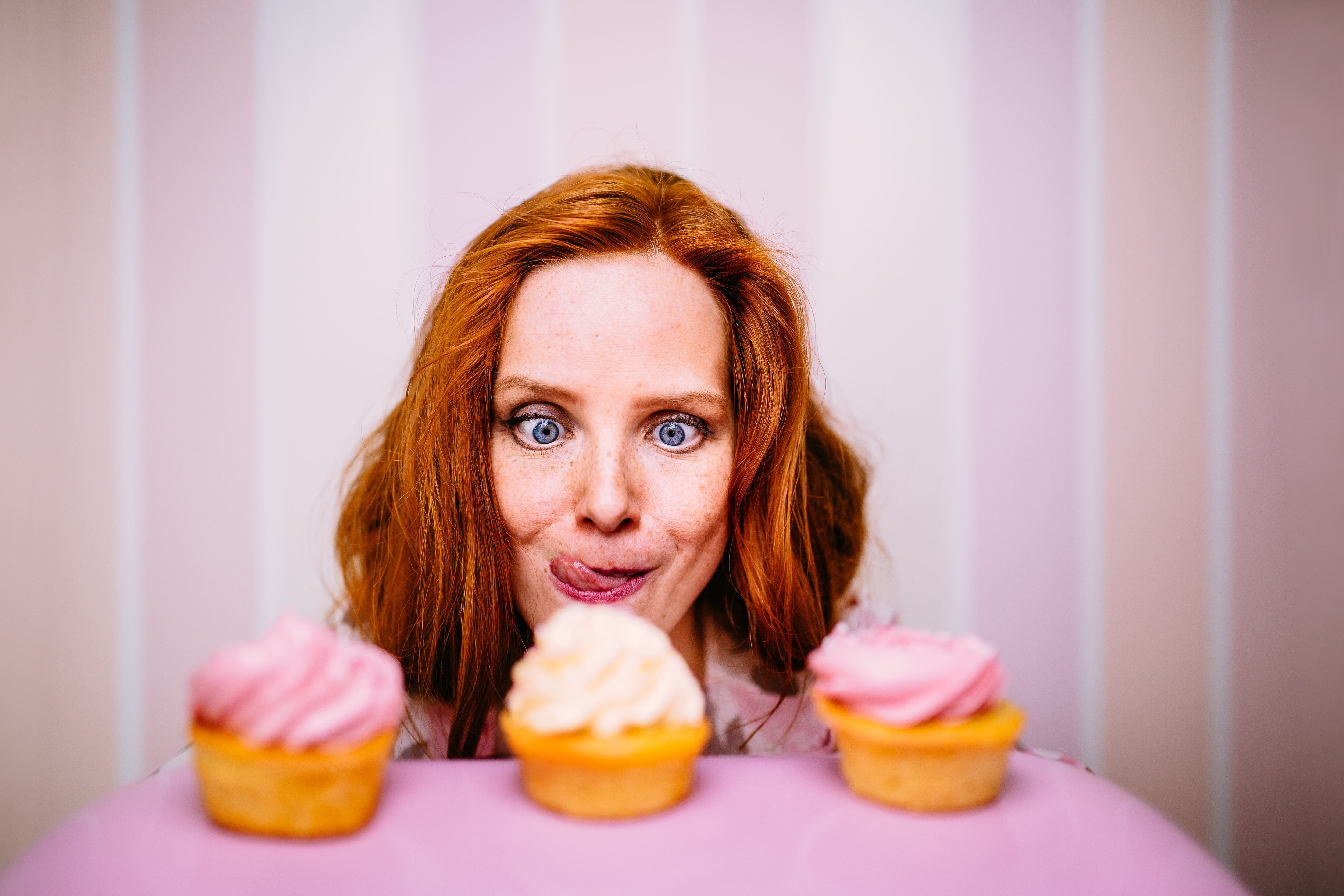 Woman eyes cupcakes