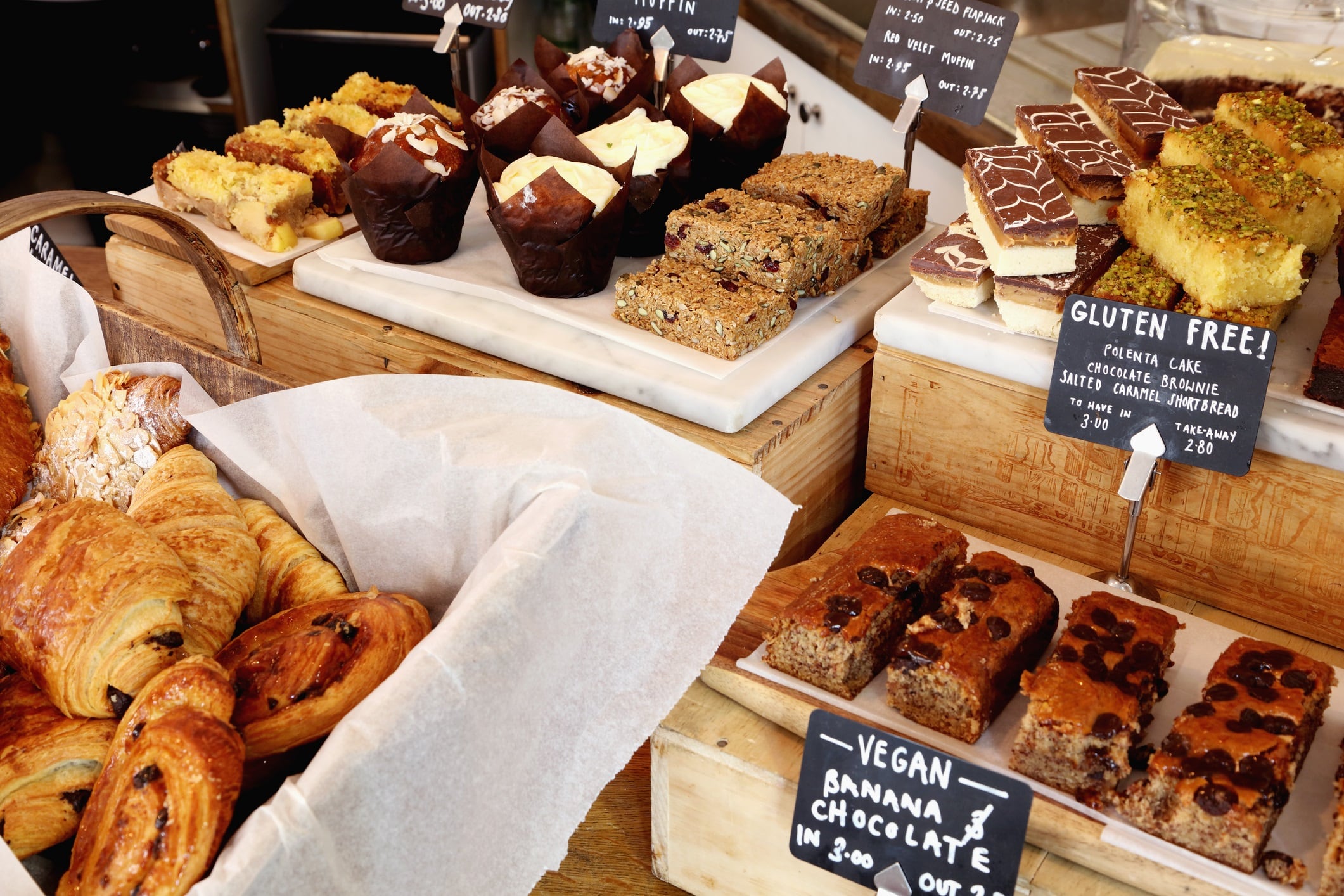 Selection of cakes and pastries in a bakery.