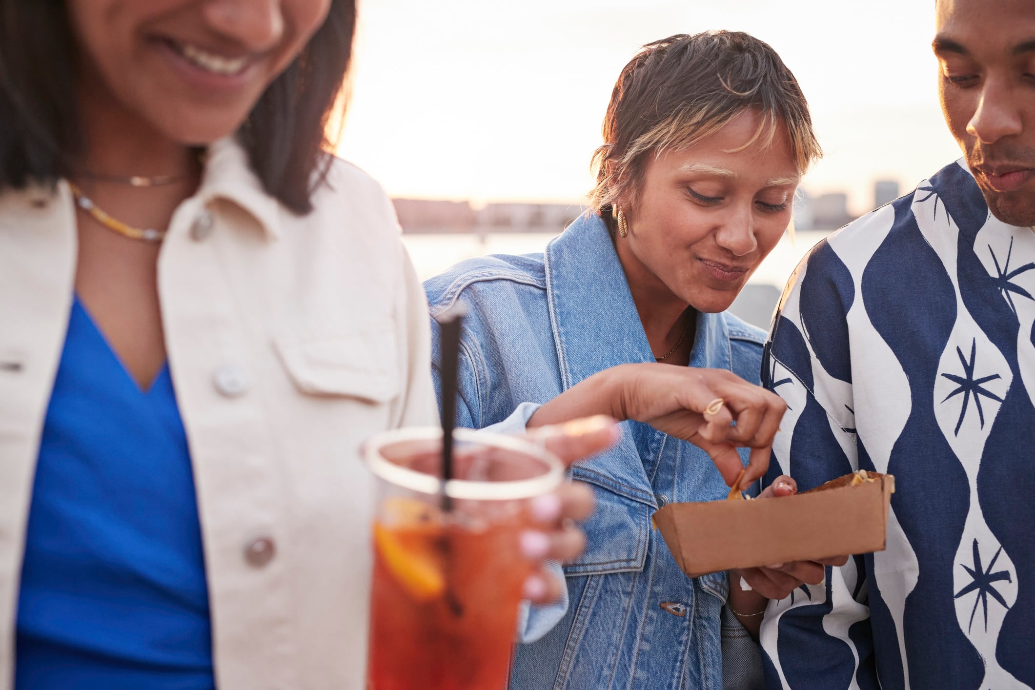 Young people eating food to go