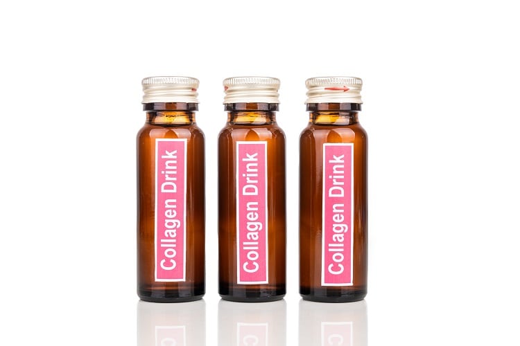 Collagen drinks in bottle as supplement for beauty, anti ageing and wellness in white background