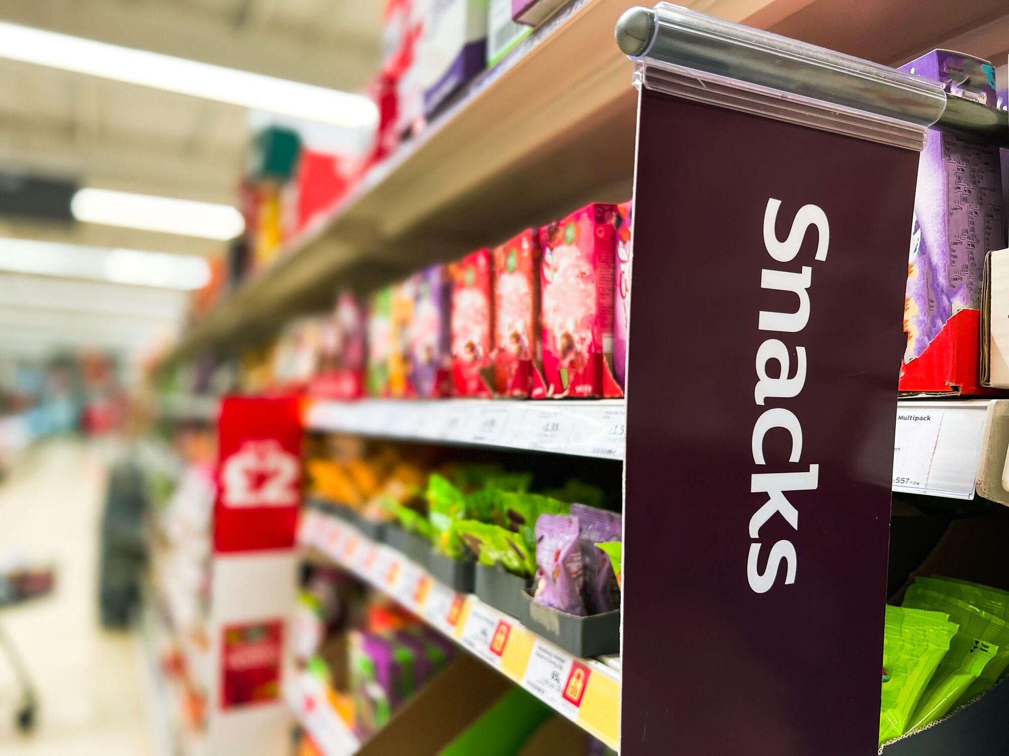 Snacks on supermarket shelf