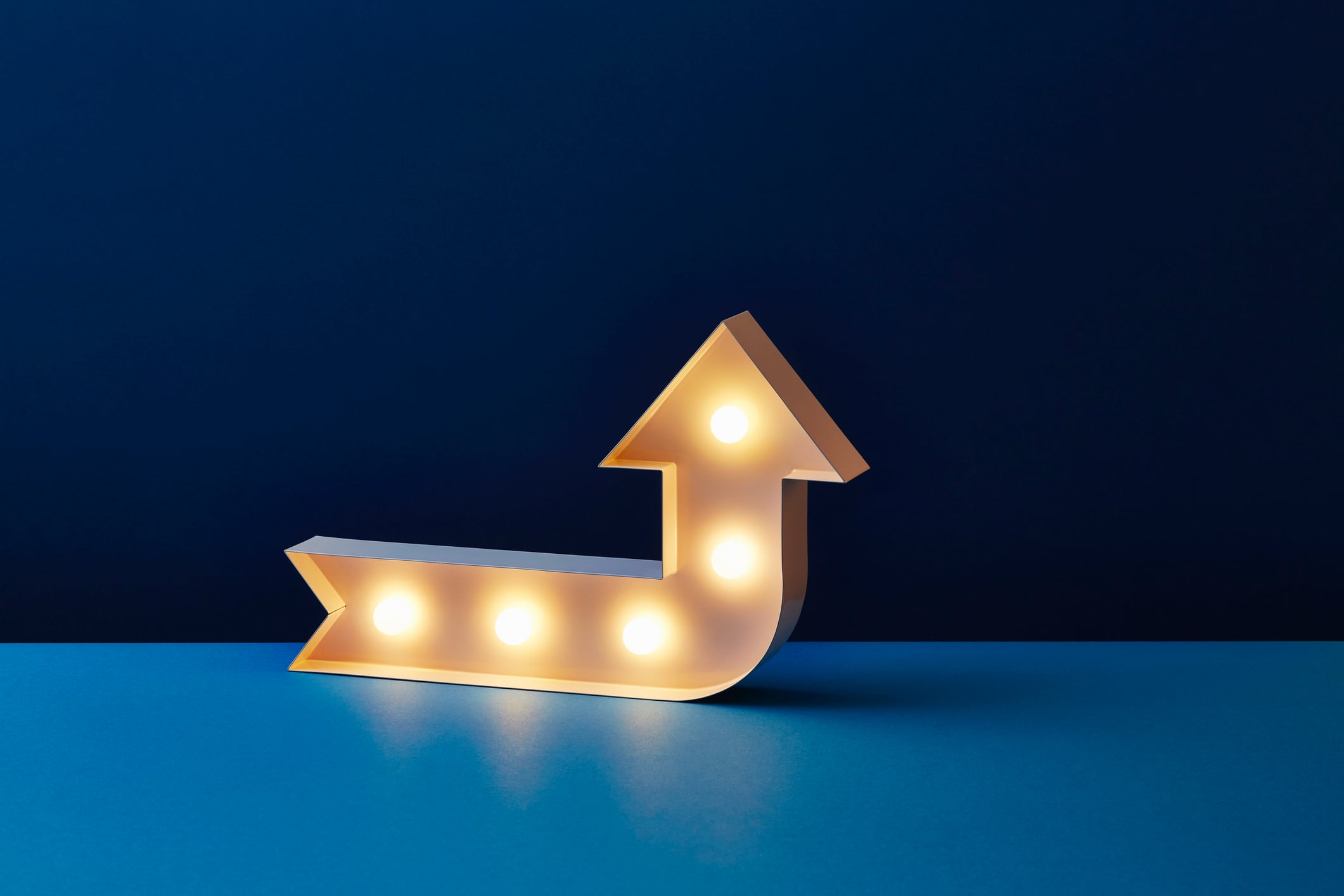 Lit up arrow pointing upwards