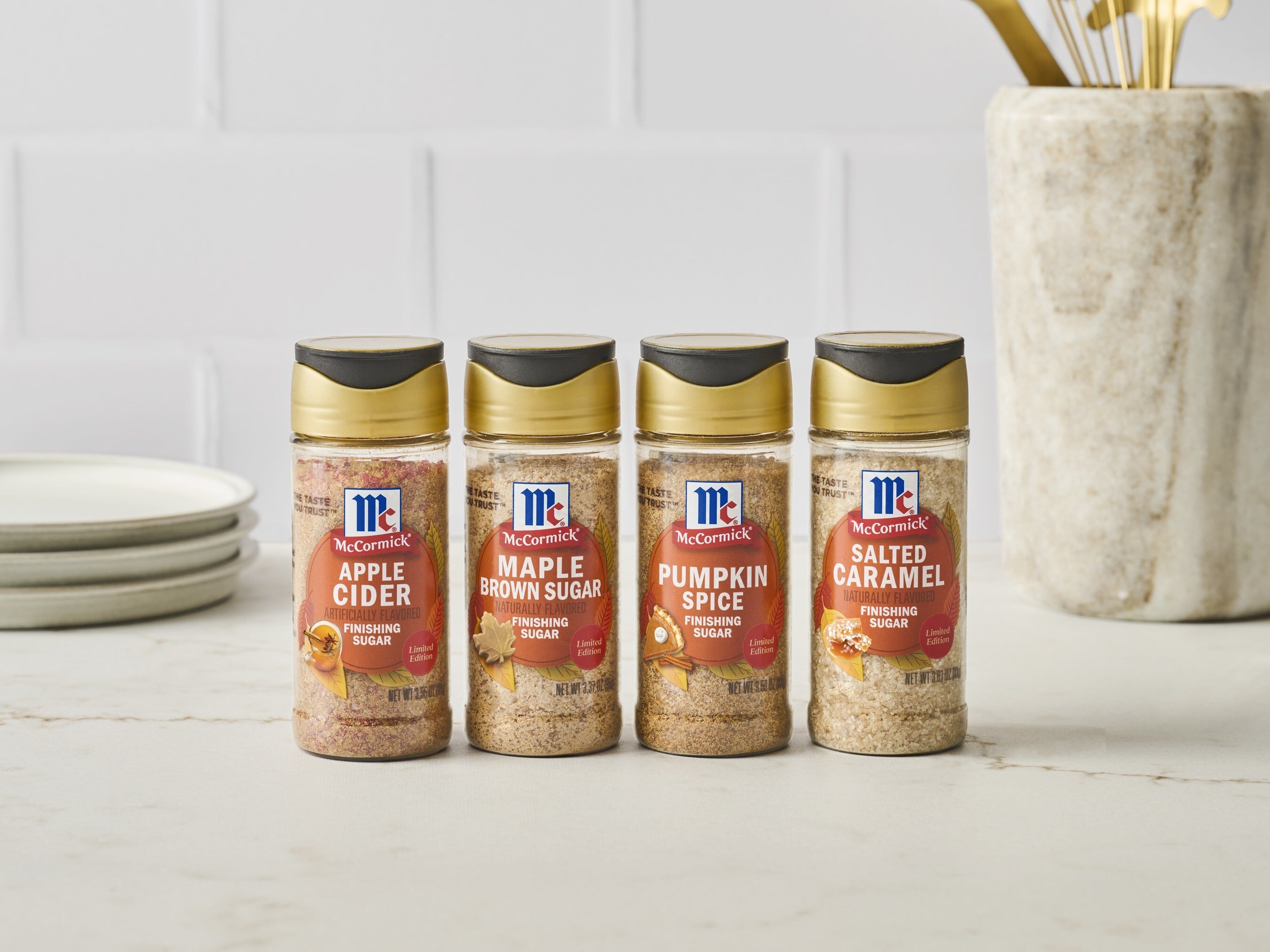 Four of McCormick's Finishing Sugars.