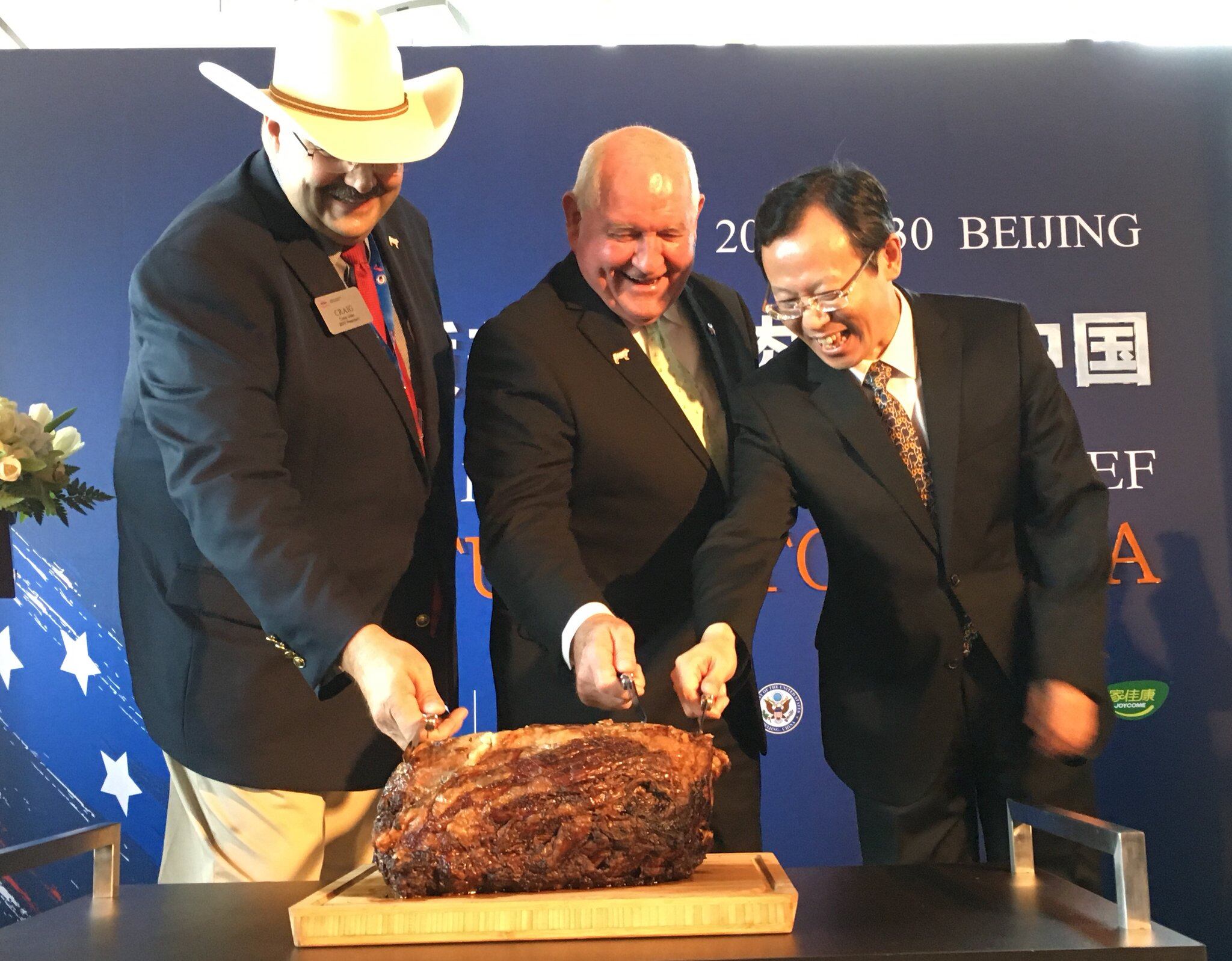 NCBA-president-Craig-Uden-Sec-Perdue-and-Luan-Richeng-VIP-of-CofCo-Group.jpg