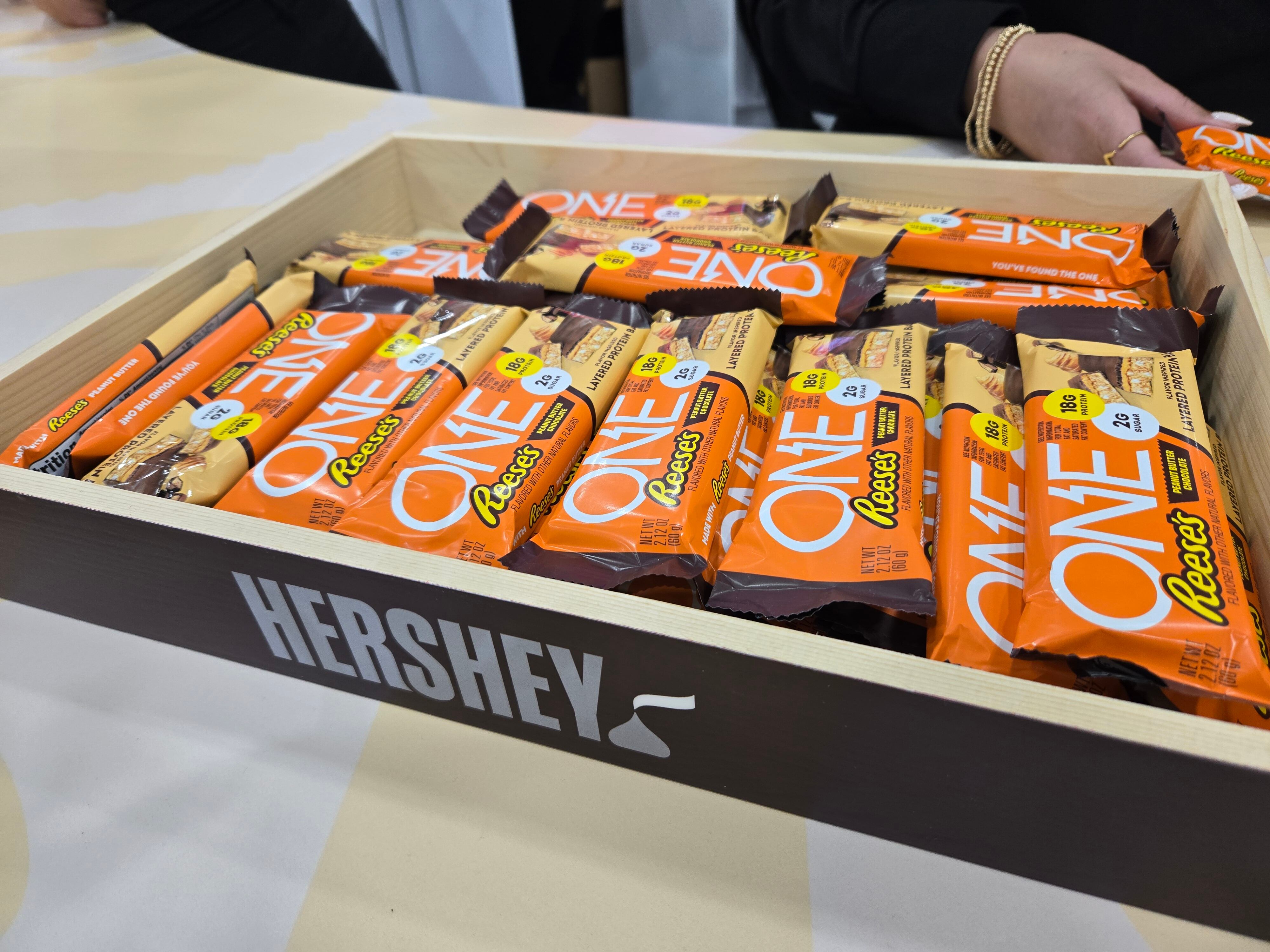 At the 2026 Sweets & Snacks Expo, Hershey highlighted its "One Hershey" strategy, which brings together confection, salty snacks and protein products to capture more snacking occasions.
