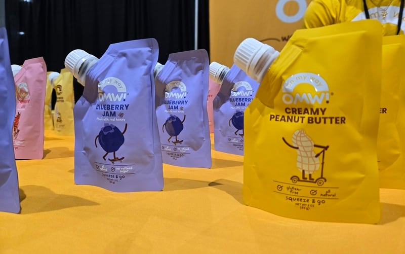 OMW! Foods is reimagining the classic peanut butter and jelly with squeezable pouches designed for on-the-go eating, outdoor adventures and nontraditional retail placement.