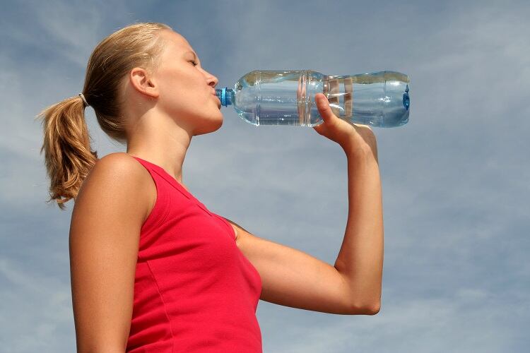 Drinking-from-plastic-water-bottle-GettyImages-PIKSEL.jpg