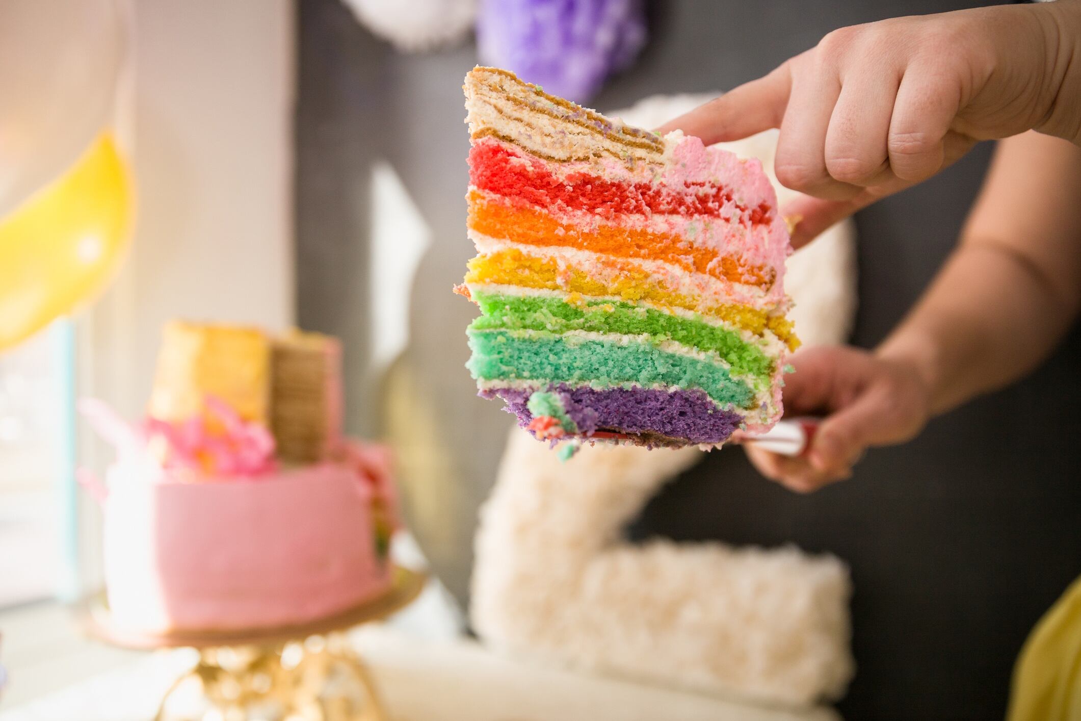 Slice of rainbow cake
