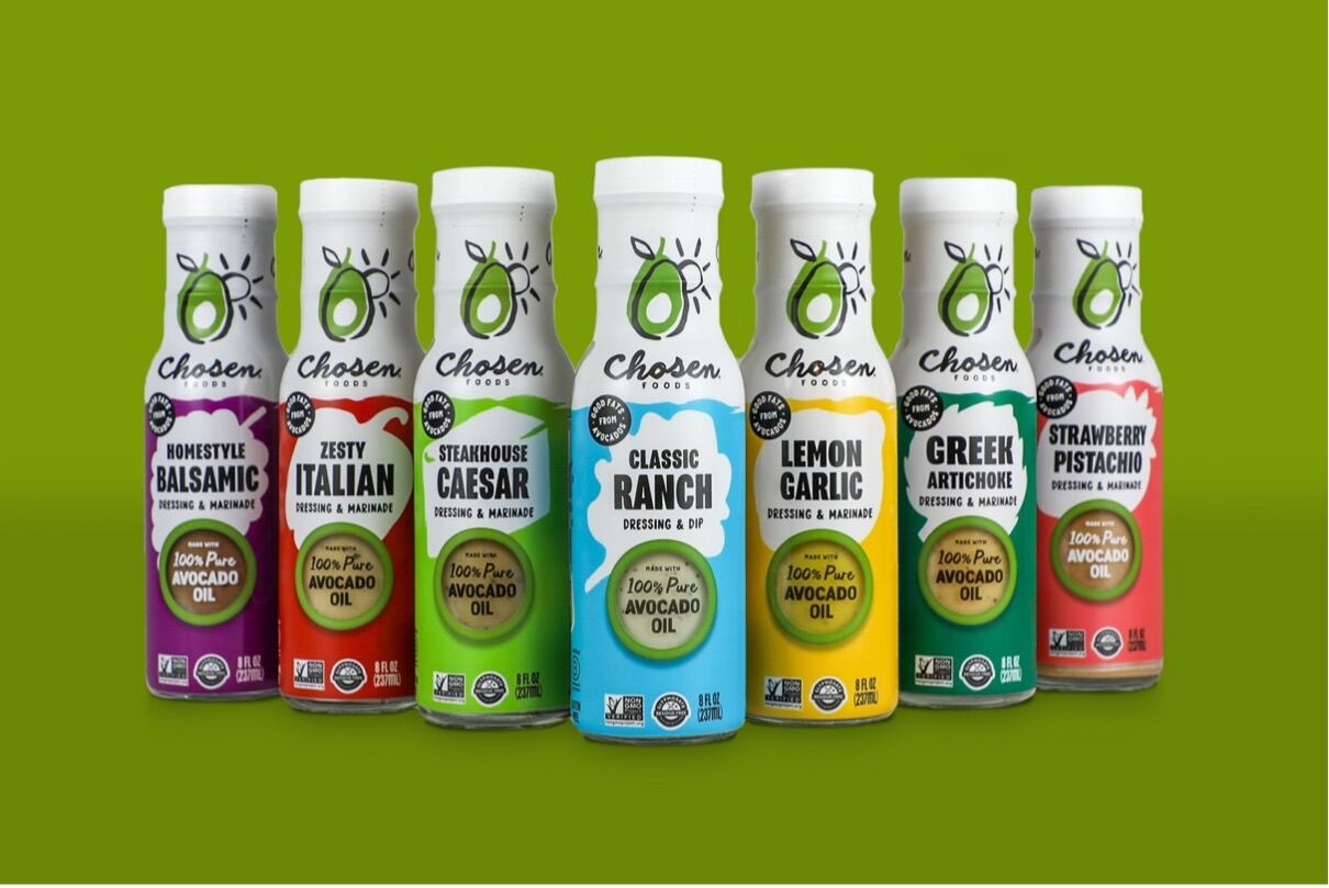 Lineup of Chosen Foods dressings including Lemon Garlic, Classic Ranch and Steakhouse Caesar and the brand's new flavors, Zesty Italian, Strawberry Pistachio, Greek Artichoke and Homestyle Balsamic.