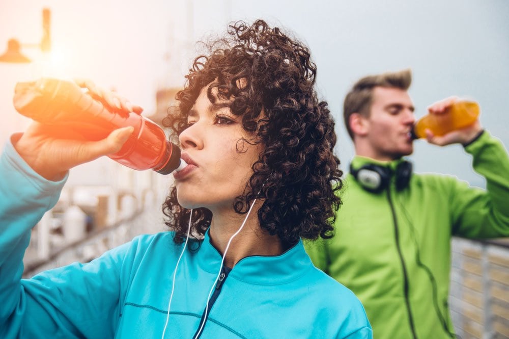 Woman drinking sports drink