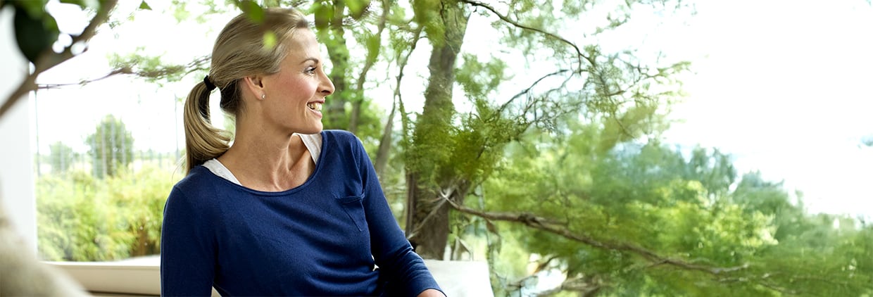 Healthy woman on balcony
