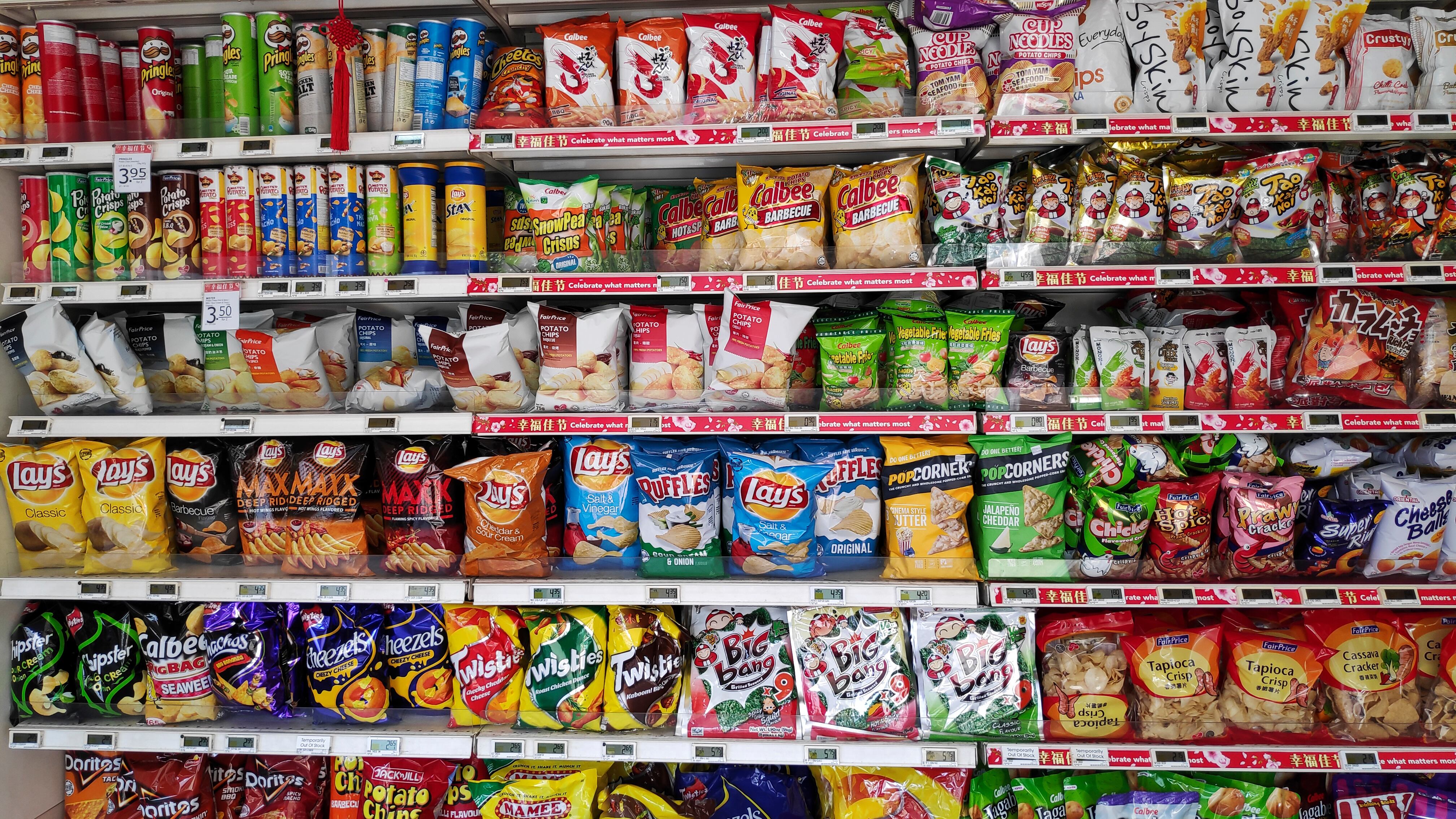 Various snacks on a store shelf