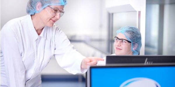 Two women working in lab R&D
