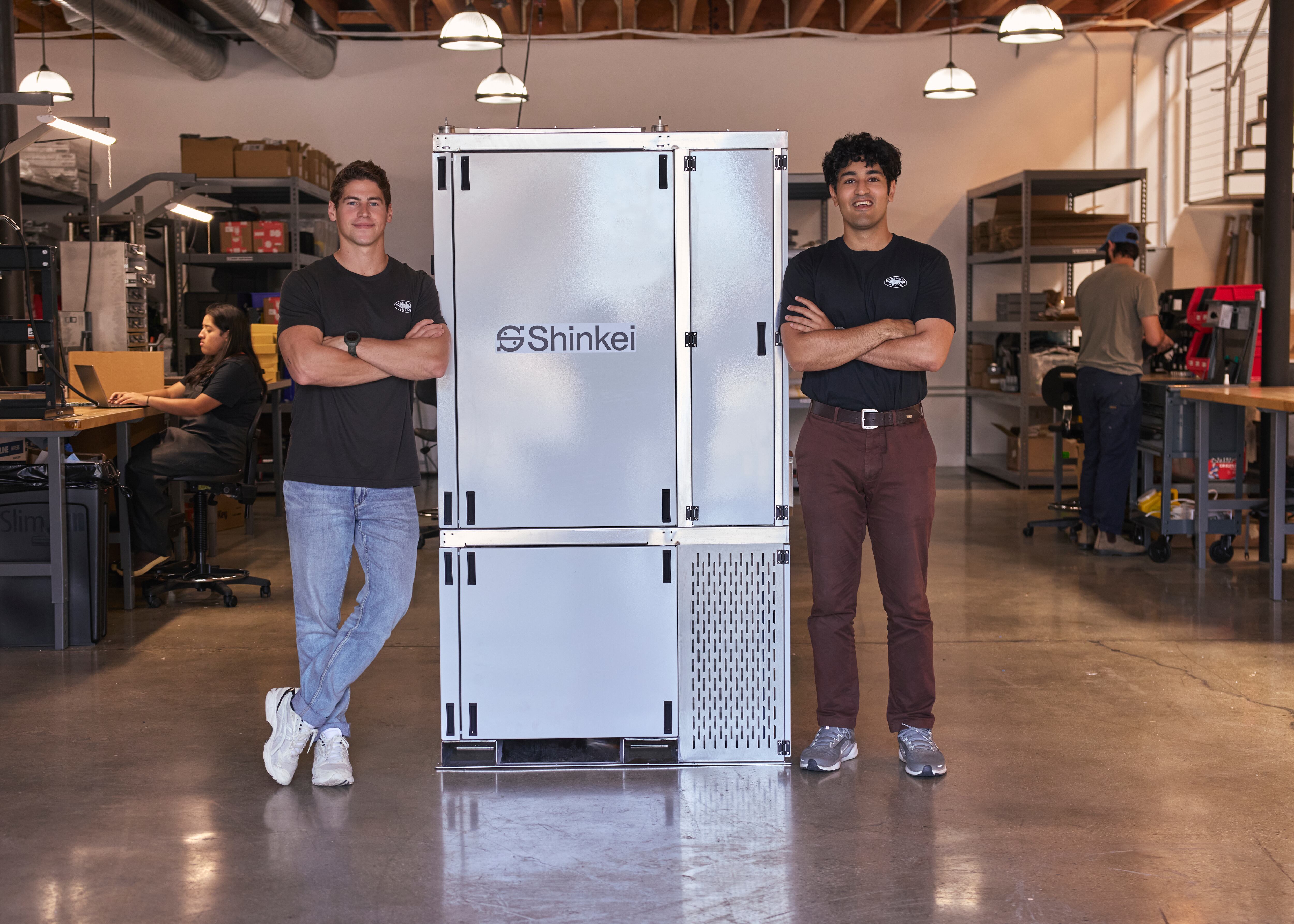 _______ (left) and Saif Khawaja with an earlier model of the Poseidon System.