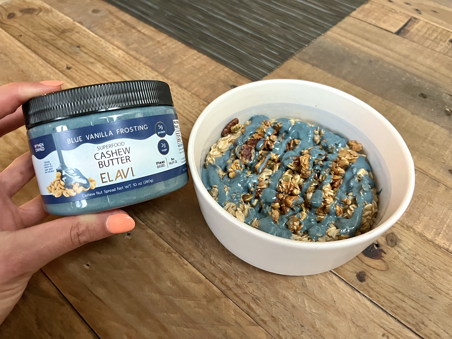 Bowl of oatmeal drizzled with Blue Vanilla Frosting made with blue spirulina
