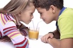 children drinking-istock-JoeLena