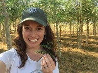 Lisa in Nicaragua eating moringa