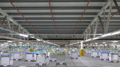 Inside an Ocado automated warehouse where orders are fulfilled using robotics and other digital capabilties. Photo Credit: Kroger 
