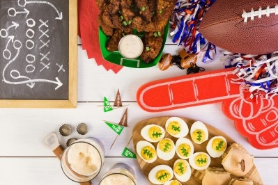 Football fans are still reaching for chicken wings on Super Bowl Sunday, but plant-based options are becoming popular party food options as well. ©GettyImages / arinahabich