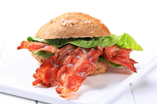 Bacon - more energy efficient and thus better for the environment than lettuce.