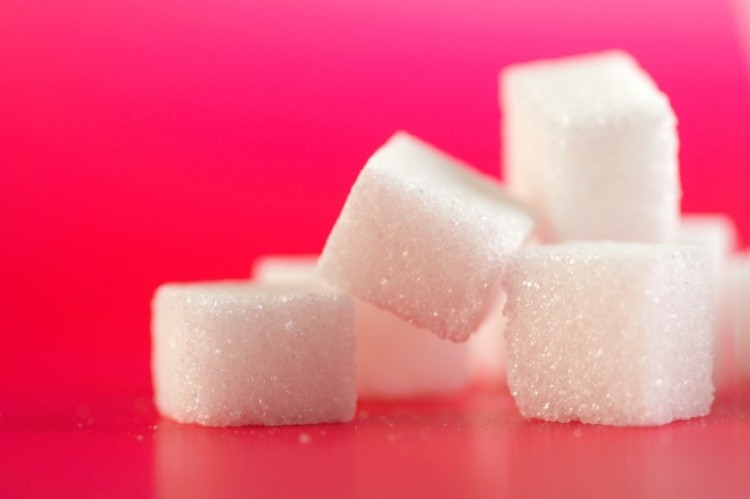 Tax food makers' caloric sweetener use to reduce consumption, study suggests