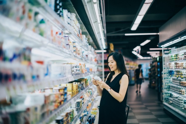 Demand for natural and whole-fat dairy items and convenient merchandising are driving the growth of the category, IRI says. ©GettyImages / d3sign