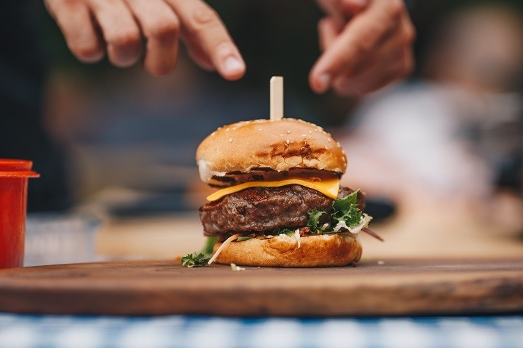 Givaudan's vegan-friendly solution works 'particularly well' in plant-based burgers, sausages, and meatballs. GettyImages/Sneksy