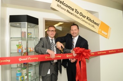 Vice president Samy Jandali (left) and technical sales and applications manager Charles Barber, Nutrition & Health for BASF North America, cut the ribbon at the official opening of BASF’s newly expanded Food Technology & Applications Center.